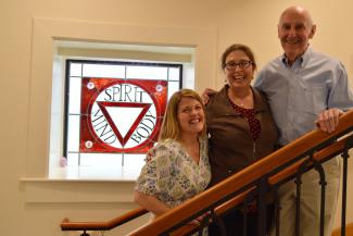 At right, the history of Springfield College Alumni Directors with Scott Taylor ’66, CAS '68, Tamie Kidess Lucey ’81, G’82, and Deleney Magoffin ’05, G’11.