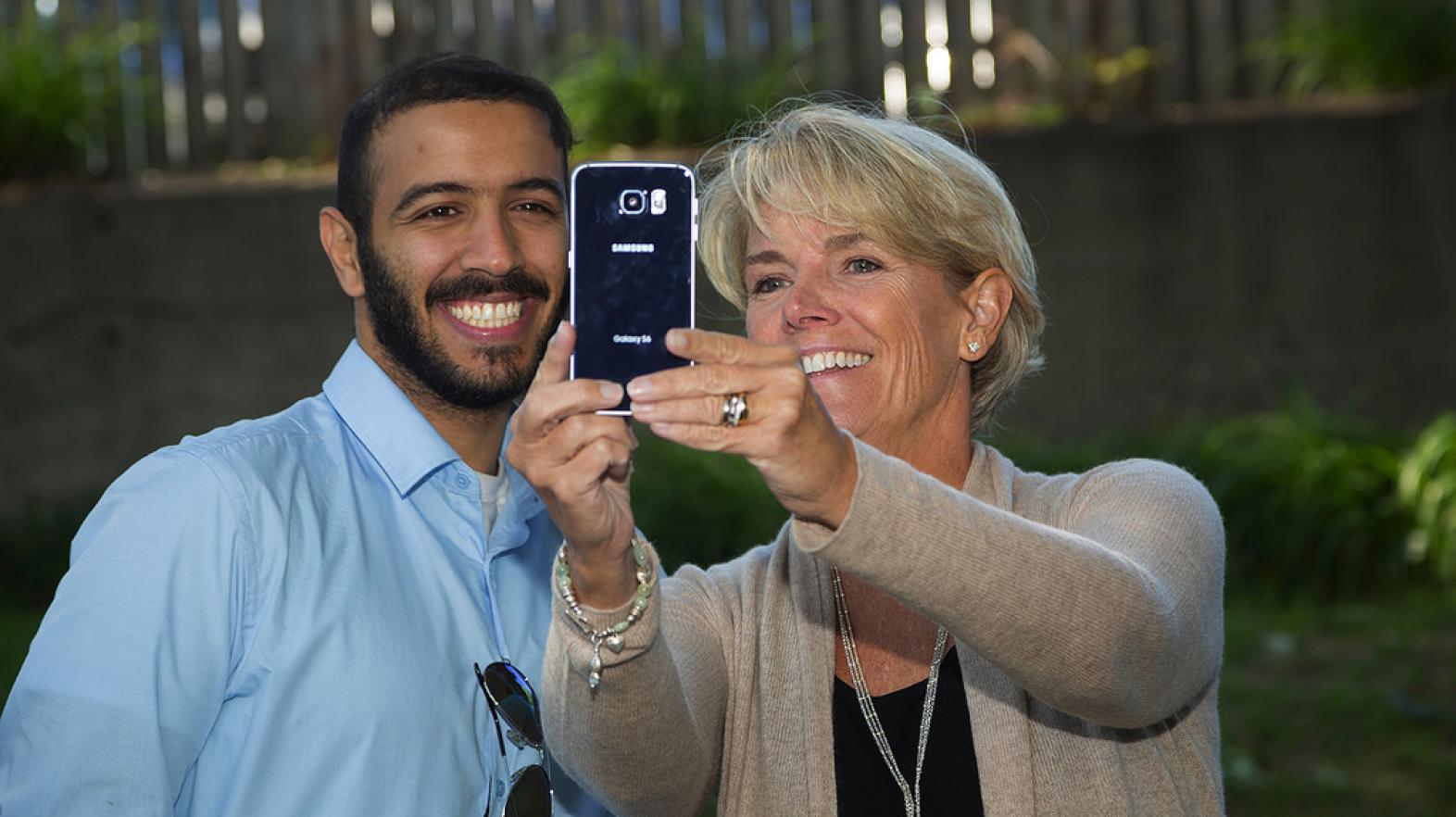 President Mary-Beth Cooper takes a selfie with a Springfield College student