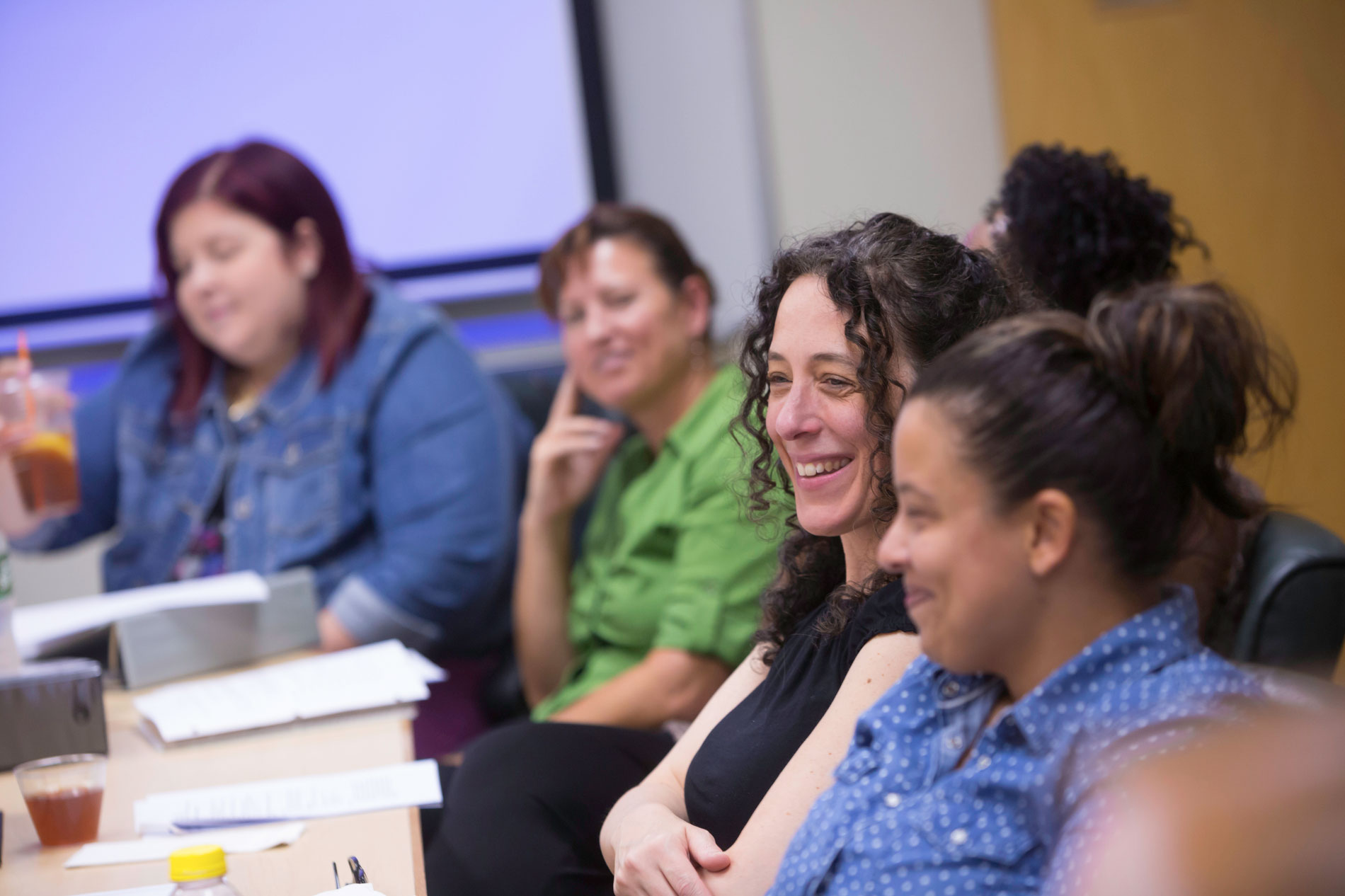 A few students sit in an MSW class