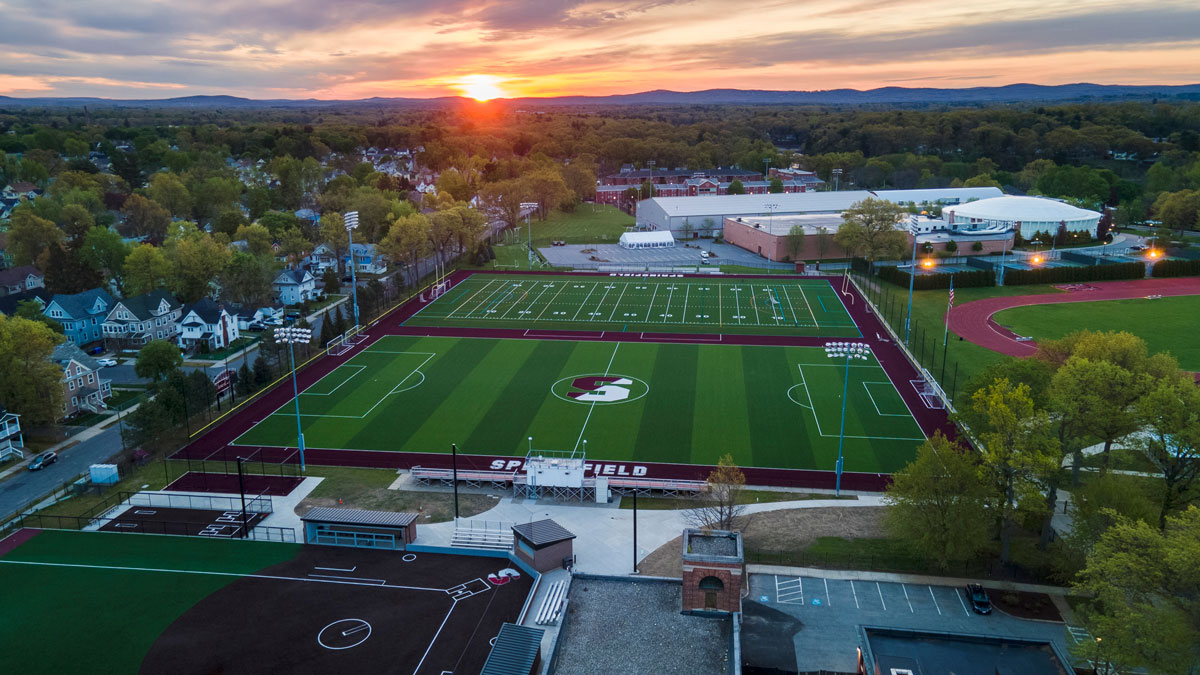 A drone image over the Springfield College campus during a sunrise