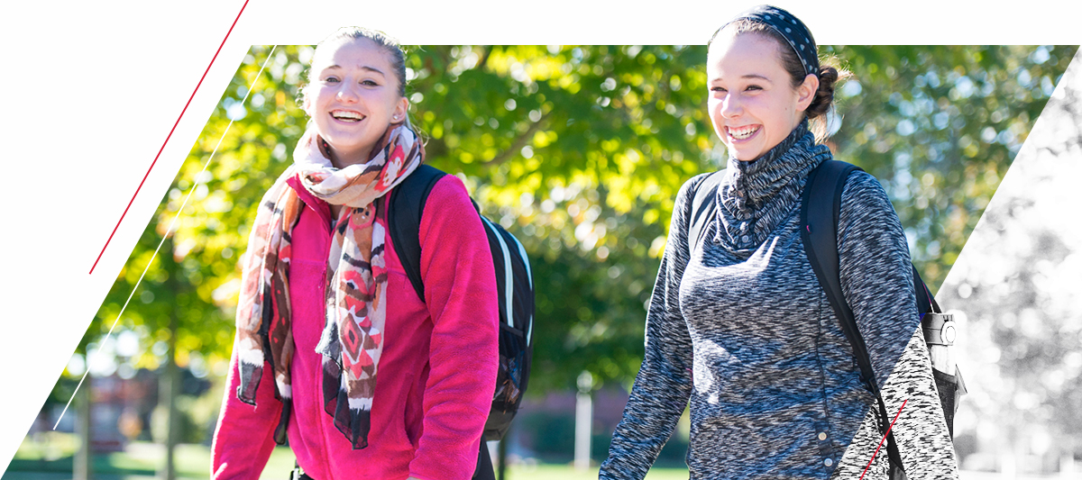 Transfer students walking on campus