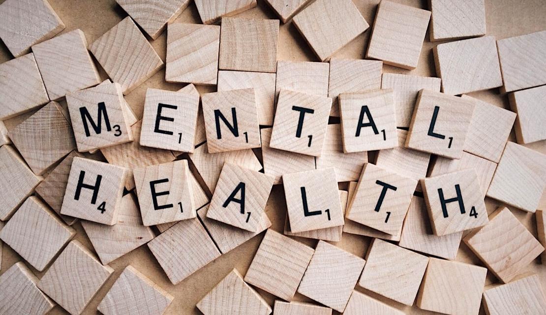 The words Mental Health spelled out in scrabble letters. 