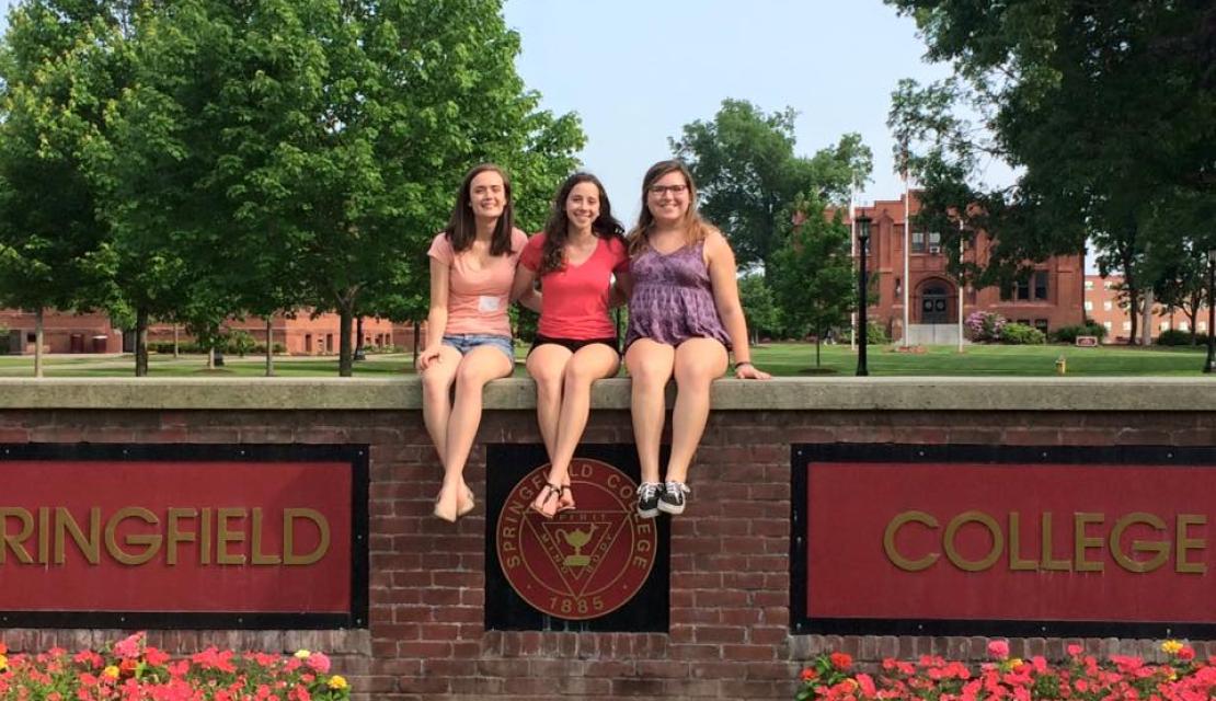 Jess Ashe and friends on the Springfield College sign. 