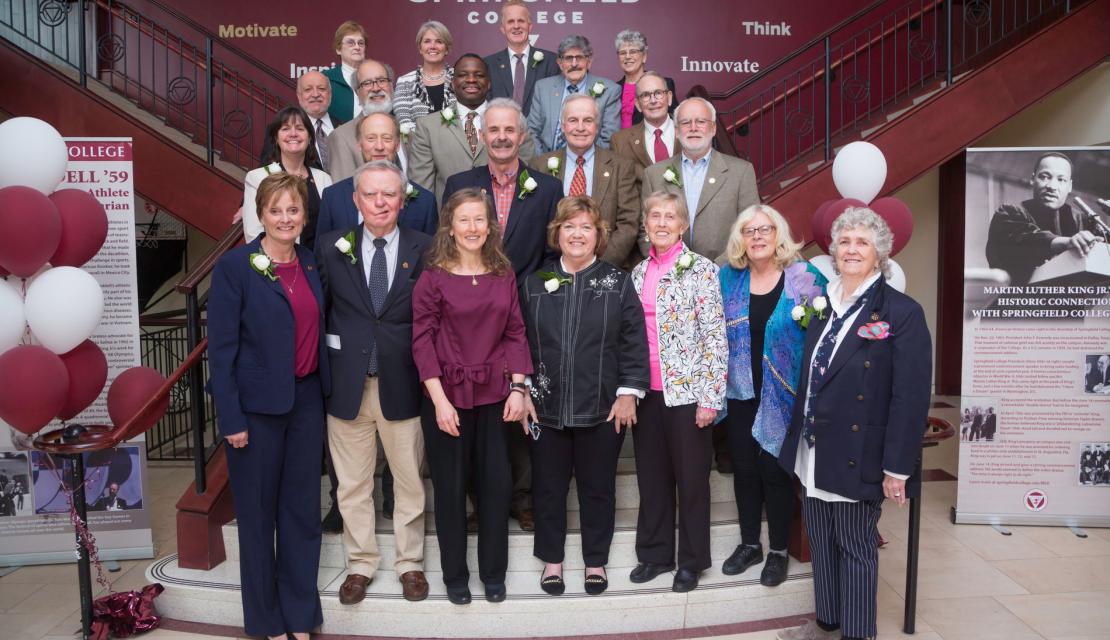 Springfield College Professors of Humanics line up on the stairs in the Union