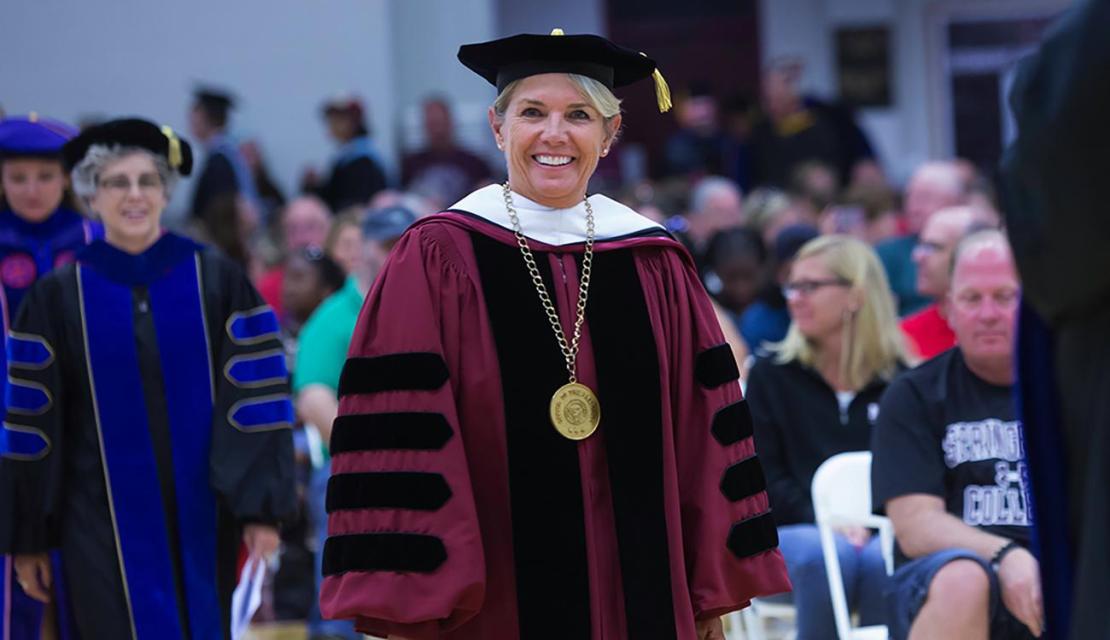 President Mary Beth Cooper at a graduation ceremony
