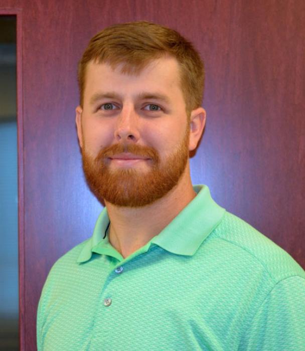 A head shot of Brett Winston, faculty member in the Department of Exercise Science and Sport Studies