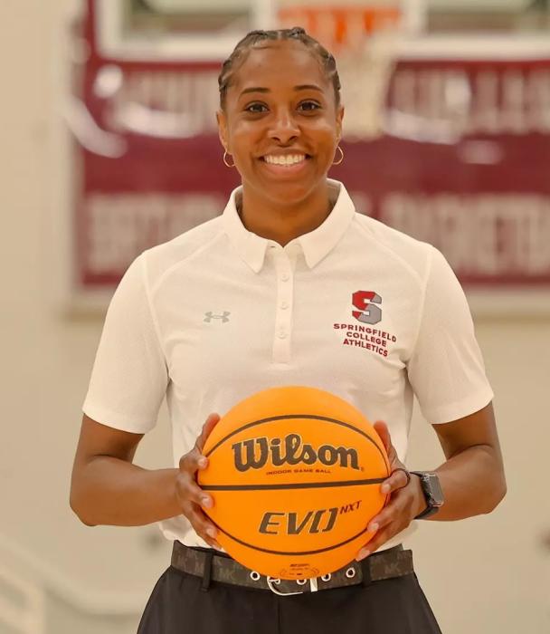 Nicole Ambrose holding basketball