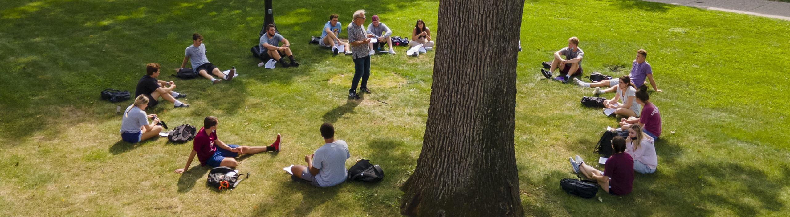 Springfield College class on the lawn