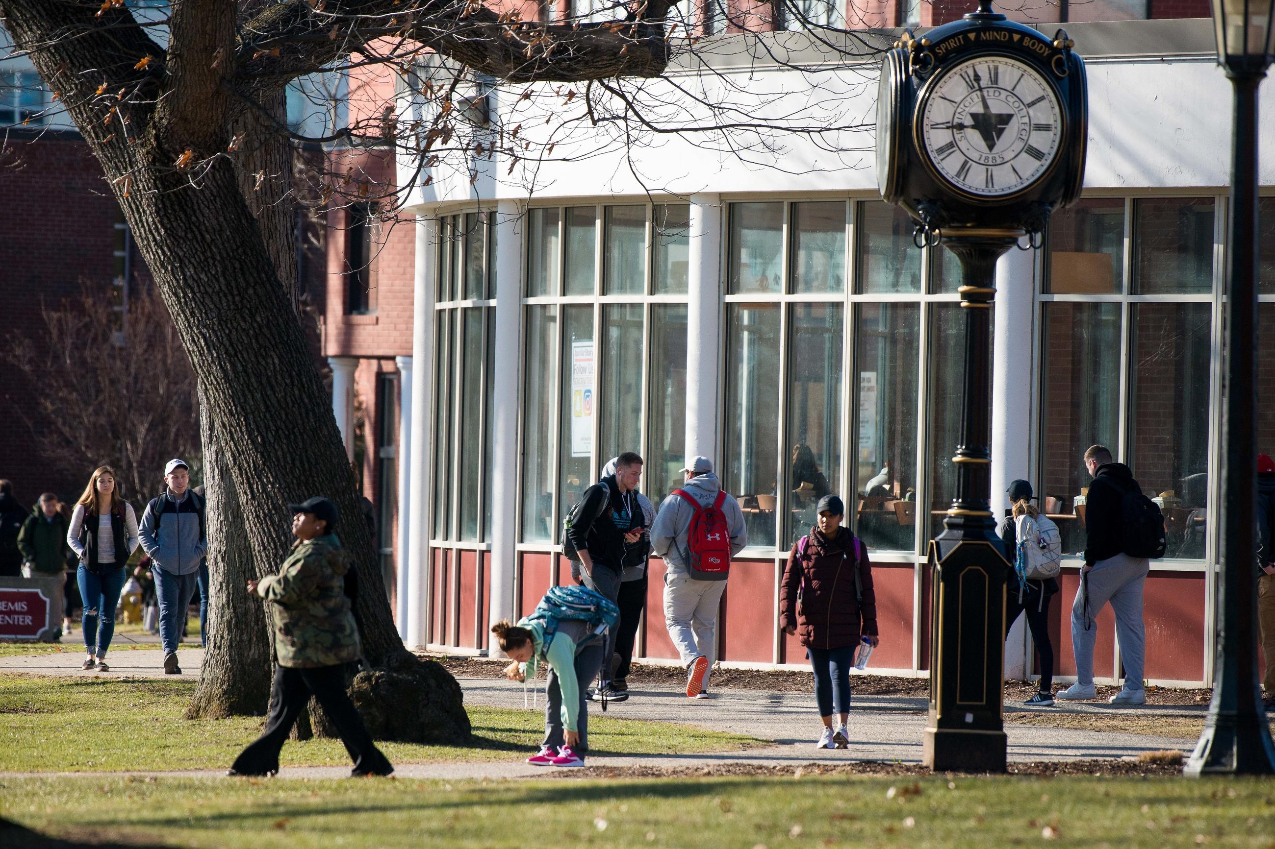Students walking about of Springfield College campus