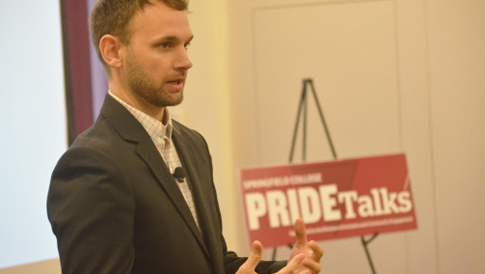 Michael C Cadaret, a professor at Springfield College, lectures during a Pride Talk. 