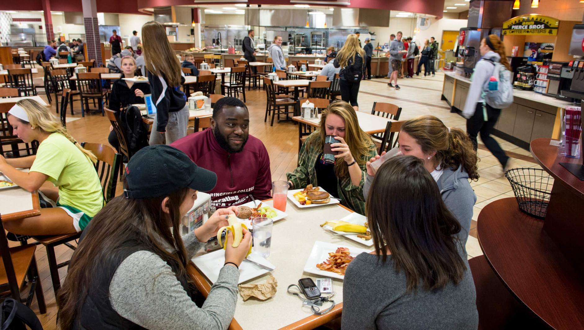 Students eating in Cheney Dining Hall. 