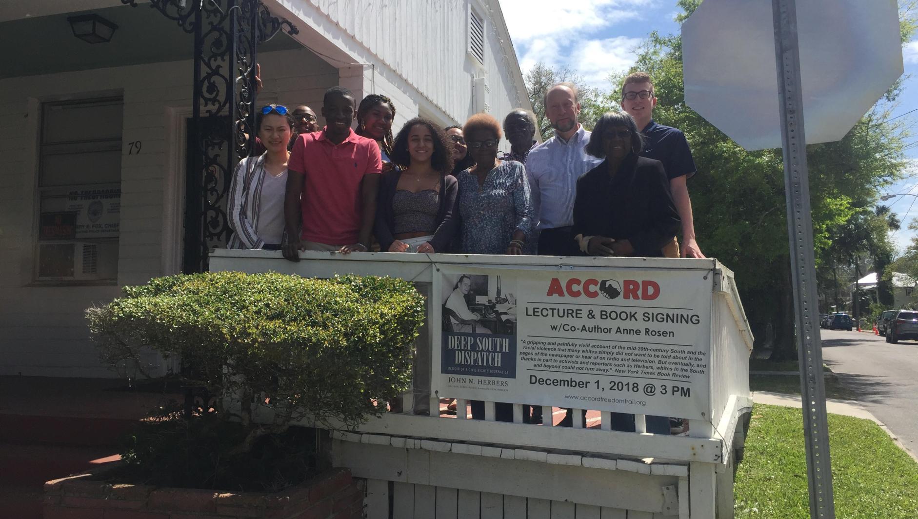 Students pose outside the Accord Civil Rights Museum