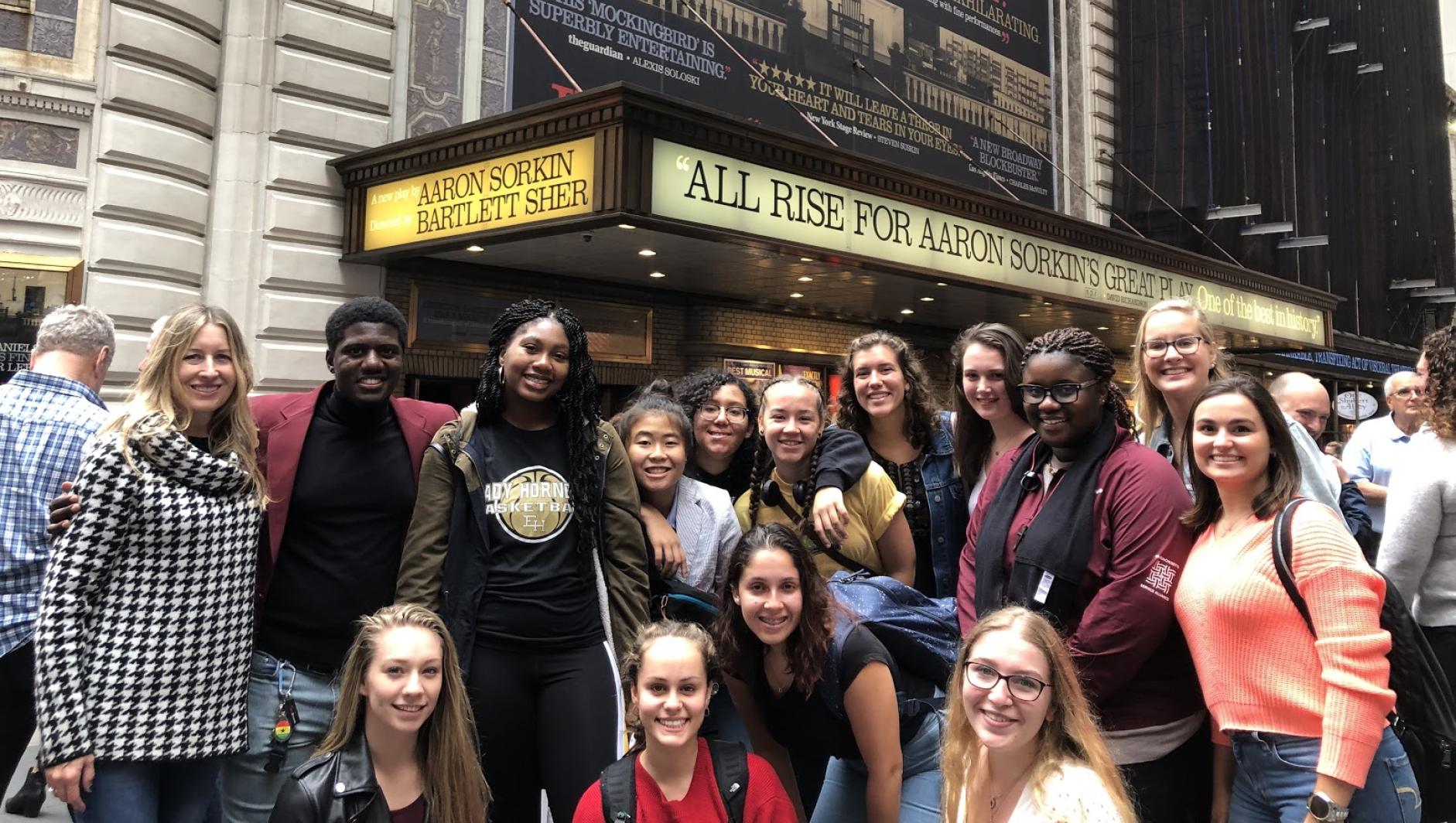 Group of Springfield College students stand outside the theater of To Kill A Mockingbird in NYC
