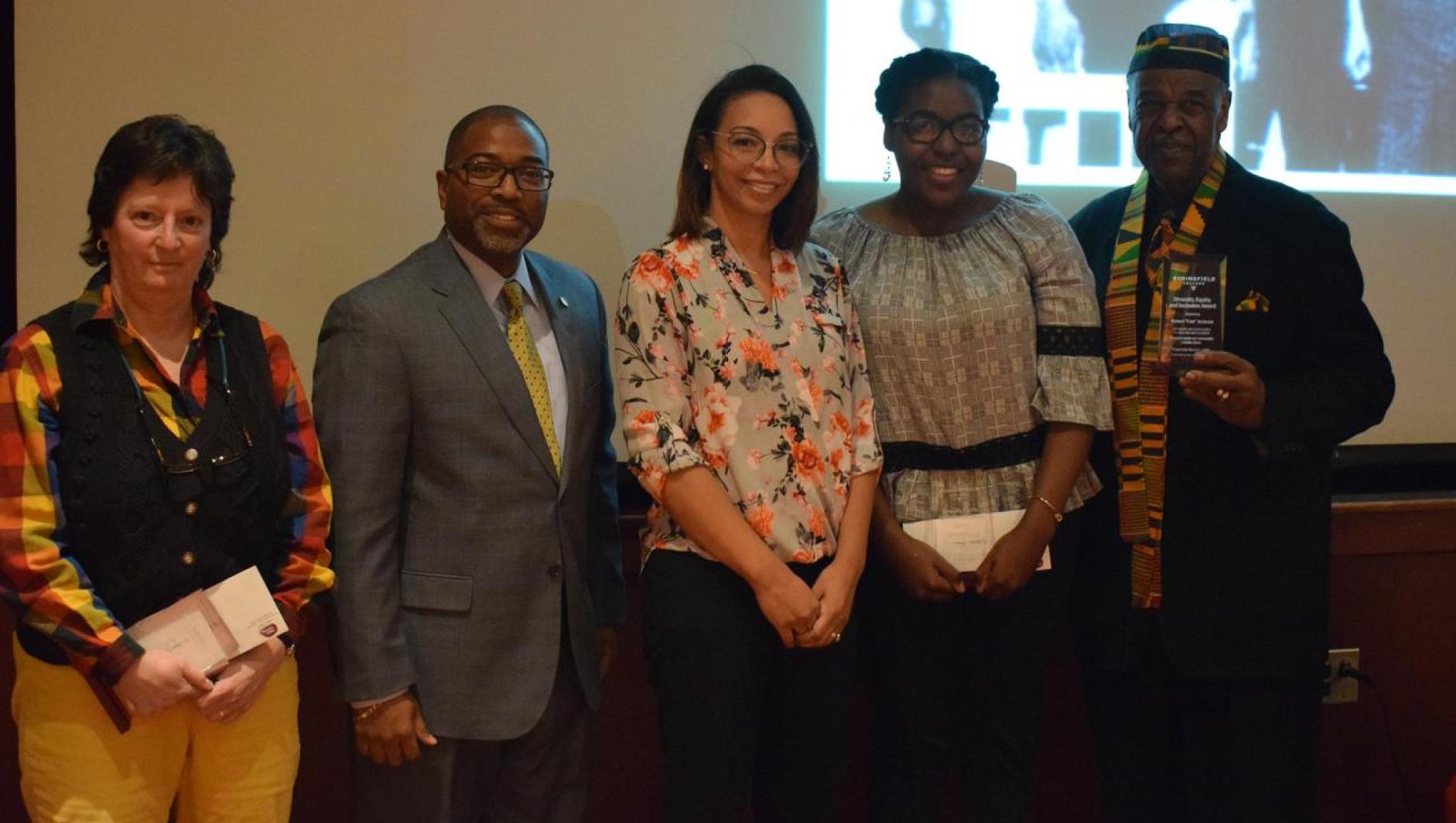 faculty member Laurel Davis-Delano, student Kathleen Morris, and Springfield community member Mr. Robert “Cee” Jackson with Dr. Calvin Hill