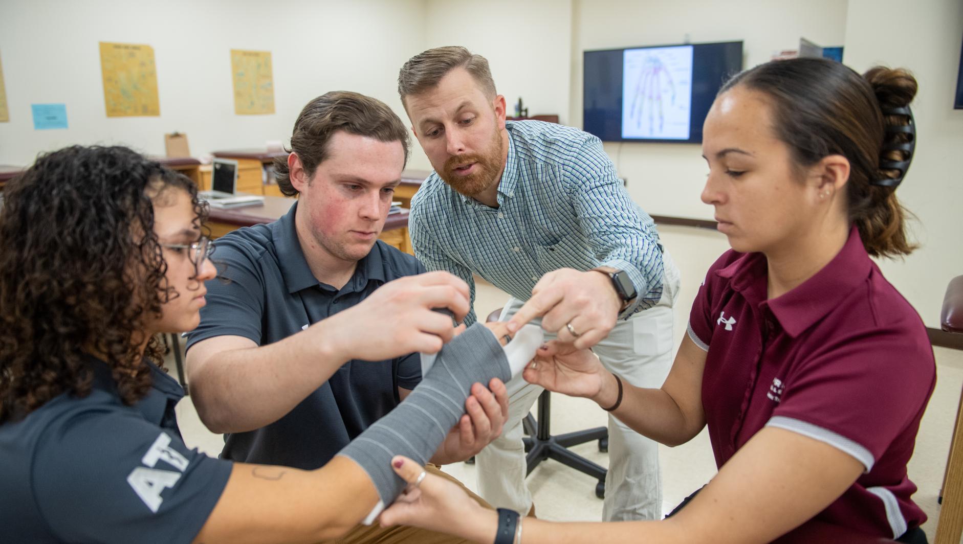 Athletic training faculty and students in the athletic training facilities at Springfield College on December 6, 2022.