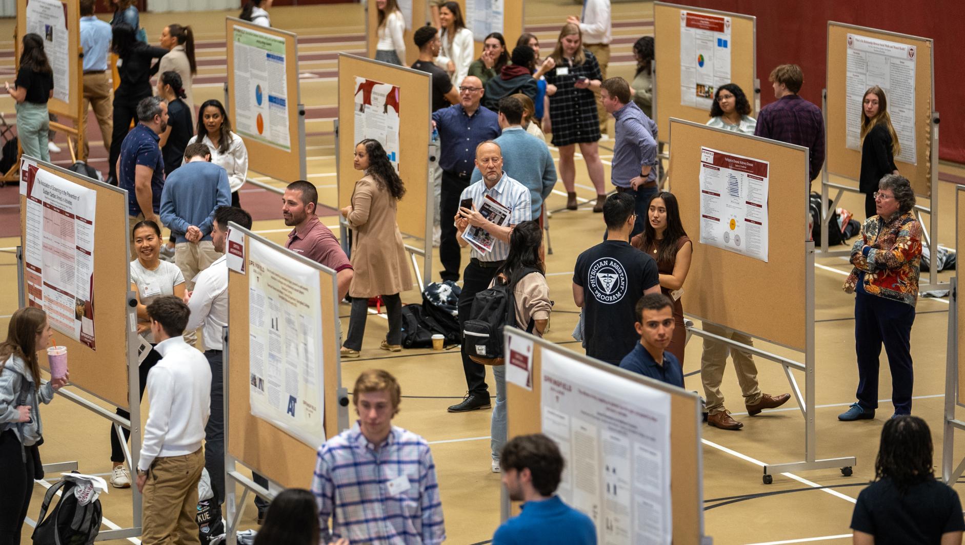 Overhead shot of students presenting with presentation boards