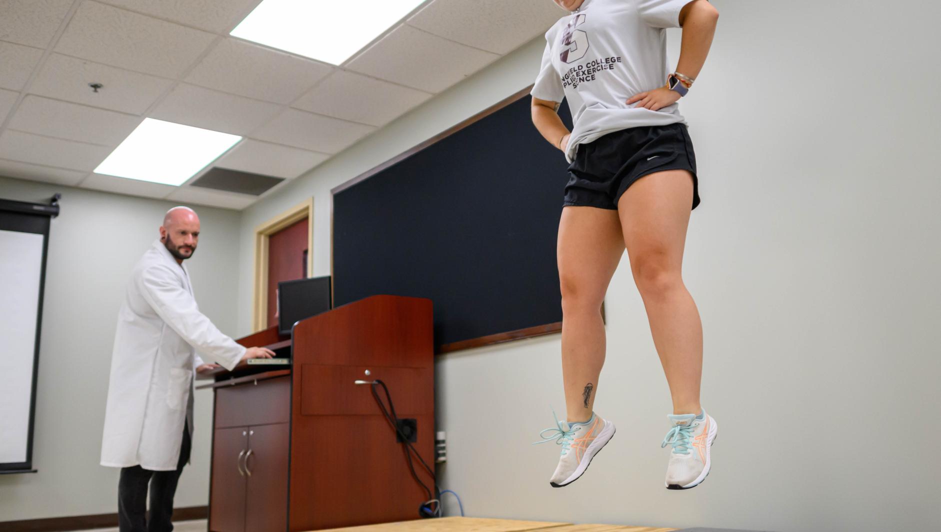 Female student jumping during Force Plate Testing