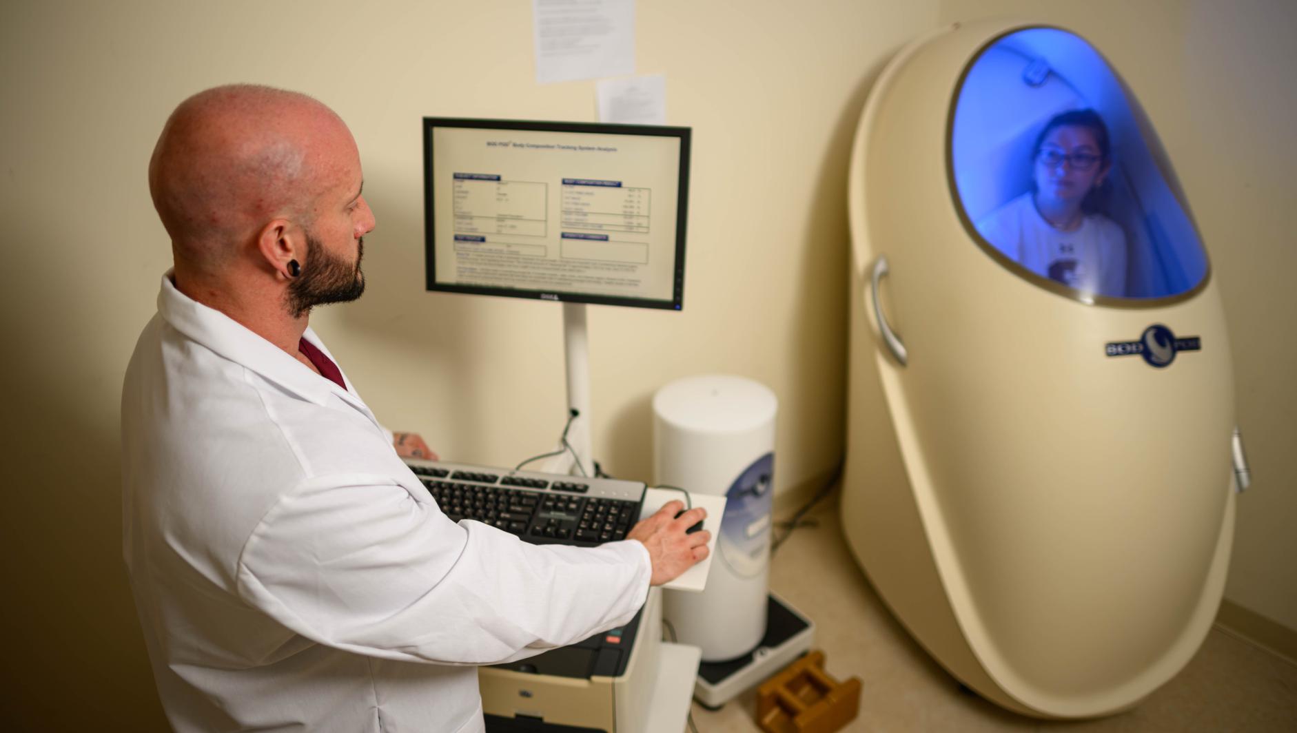 A Bod Pod is used to measure a person’s weight and volume to determine body density and calculate one’s percentage of body fat . The device is located in the Springfield College Human Performance Lab