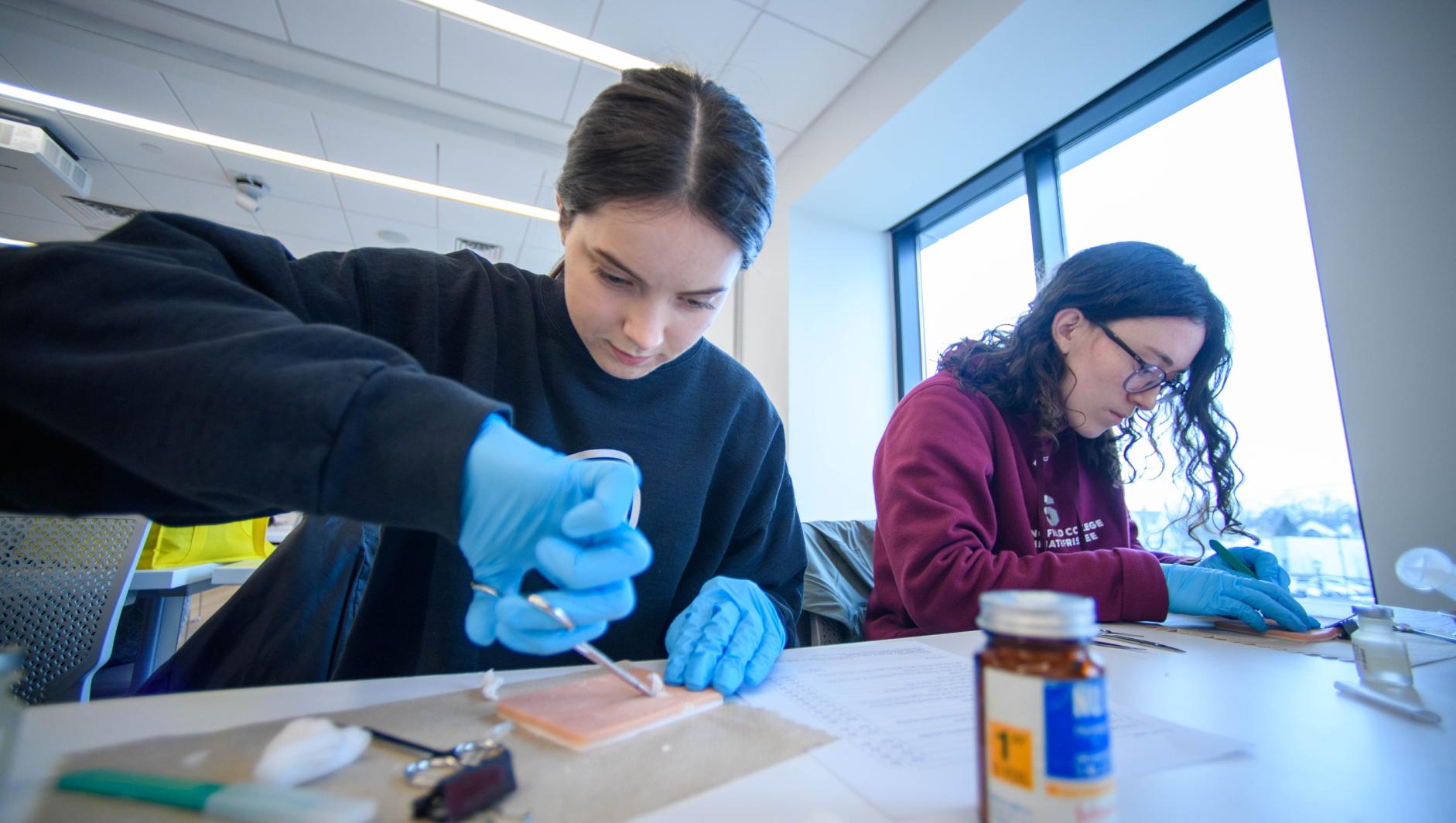 Springfield College Physician Assistant Studies students train how to administer hypodermic needles and drain abscesses inside the Health Sciences Center on Friday, February 2, 2024.