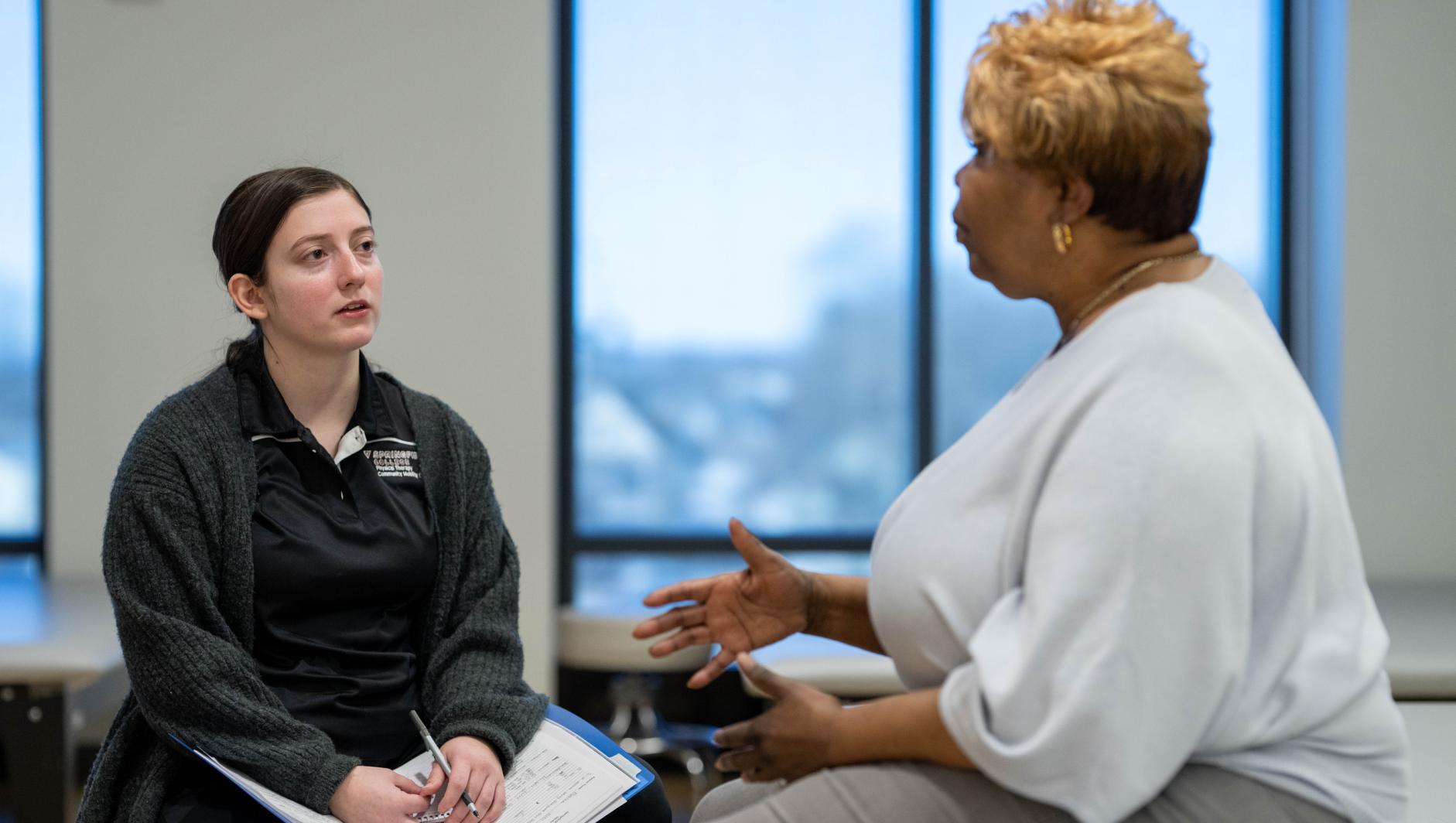 Physical therapy students work with community members during a Community Clinic in the Health Sciences Center at Springfield College on Tuesday, February 6, 2024