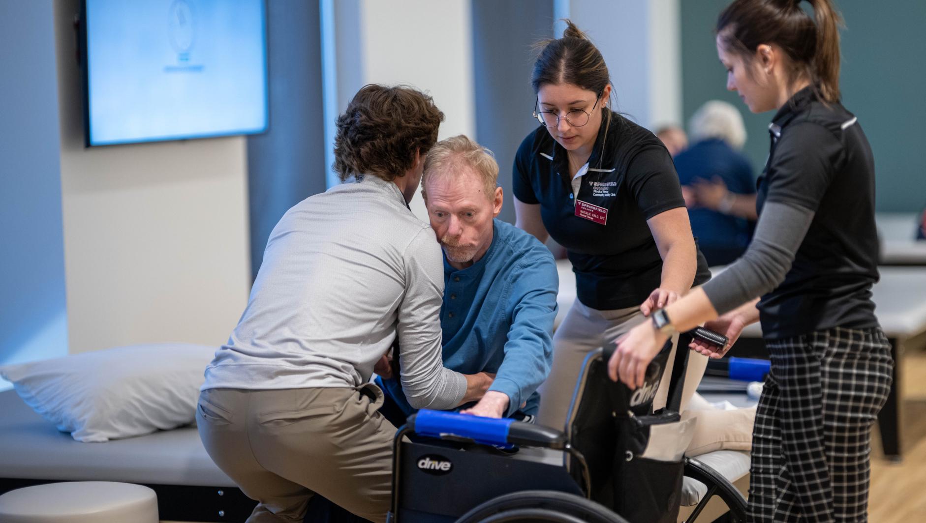 Physical therapy students work with community members during a Community Clinic in the Health Sciences Center at Springfield College on Tuesday, February 6, 2024