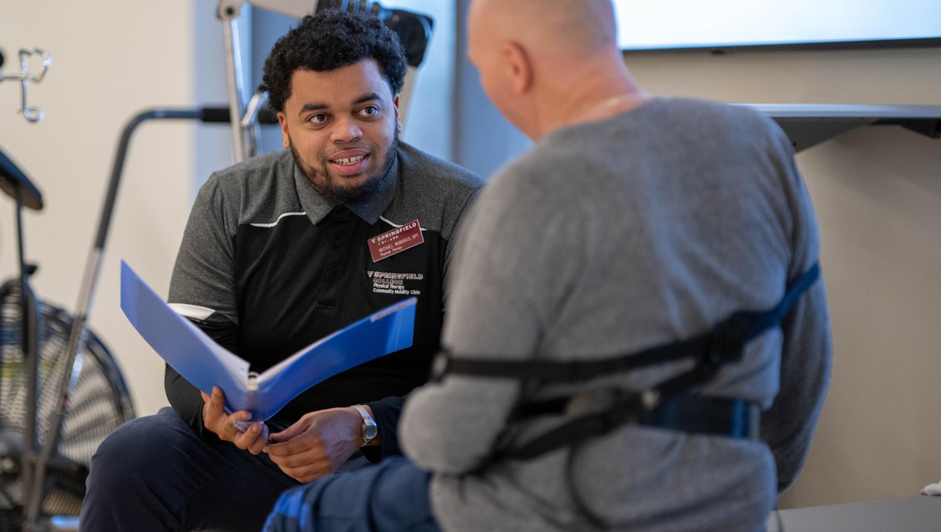 Physical therapy students work with community members during a Community Clinic in the Health Sciences Center at Springfield College on Tuesday, February 6, 2024