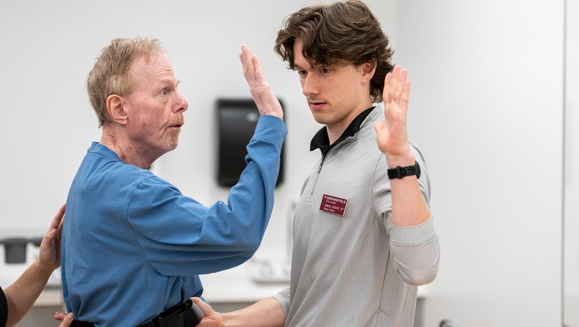 Physical therapy students work with community members during a Community Clinic in the Health Sciences Center at Springfield College on Tuesday, February 6, 2024
