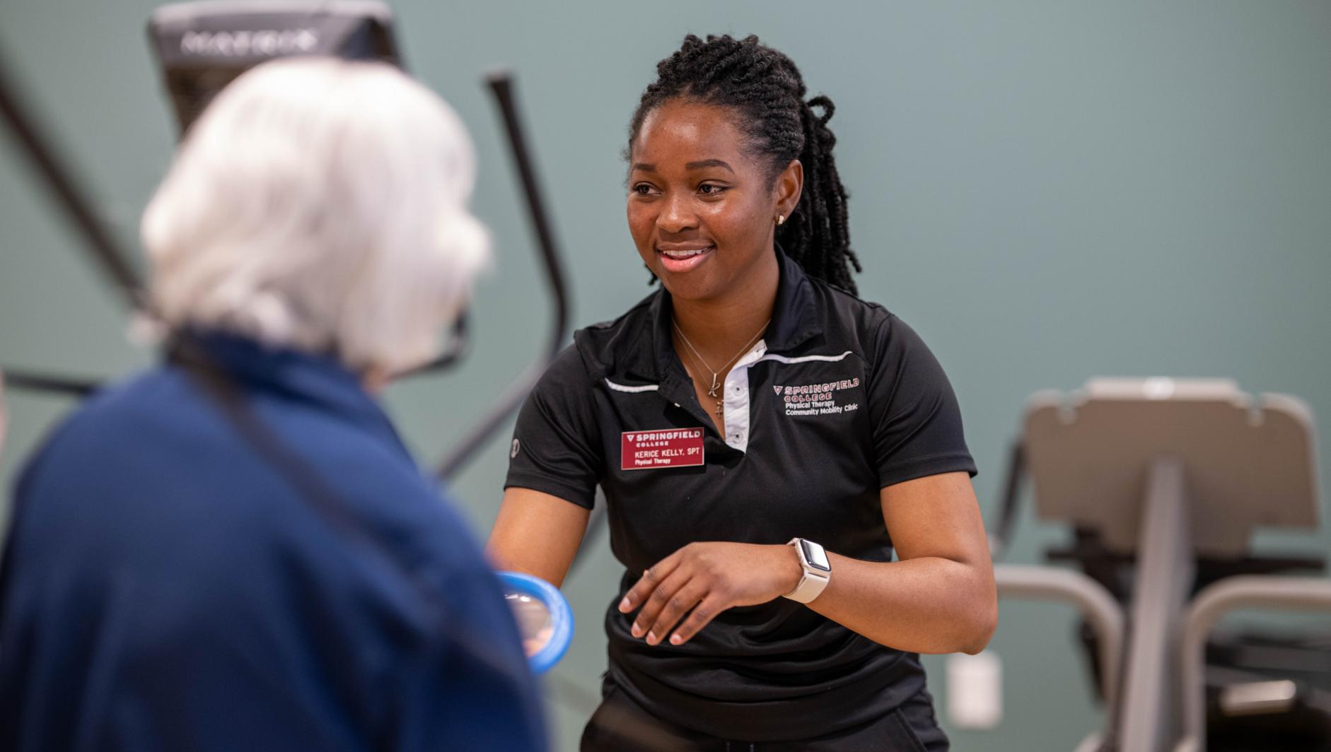 Physical therapy students work with community members during a Community Clinic in the Health Sciences Center at Springfield College on Tuesday, February 6, 2024
