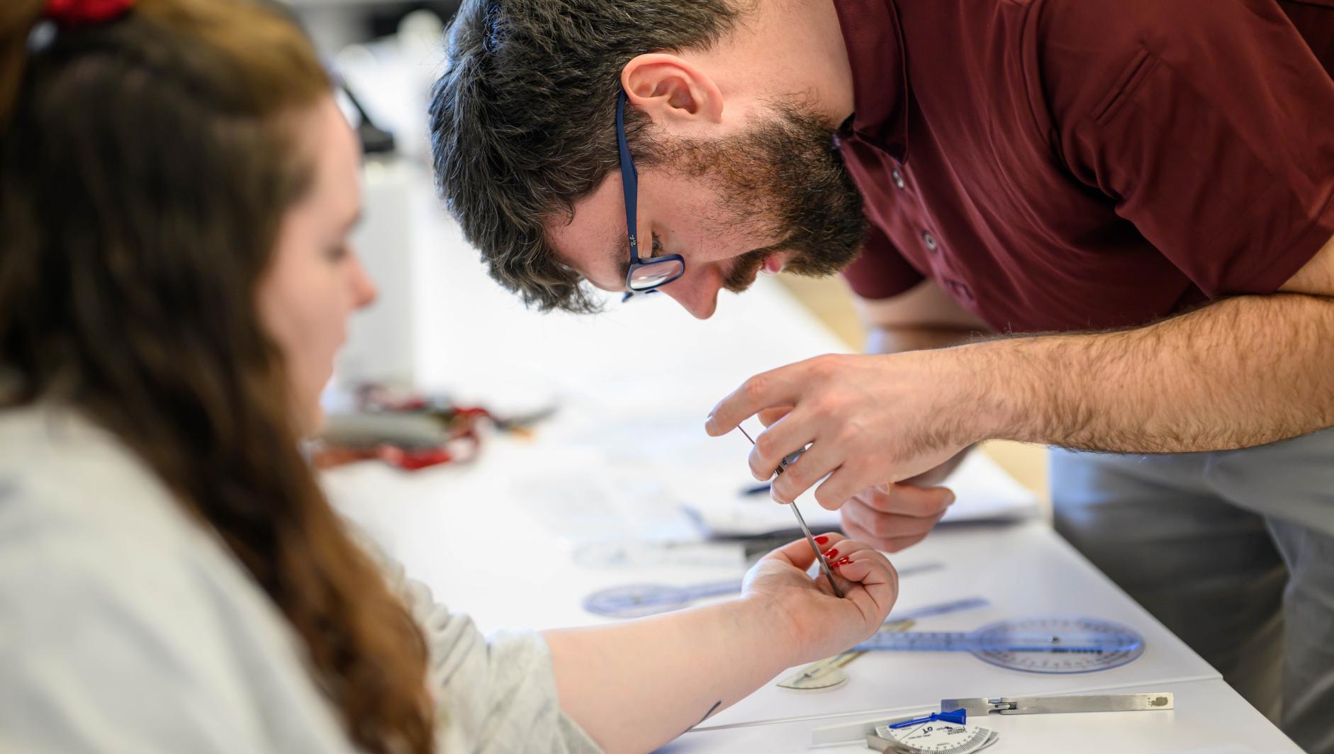 Springfield College Occupational Therapy students practice their clinical simulation competency inside the ADL Lab at the Health Sciences Center on February 15, 2024.
