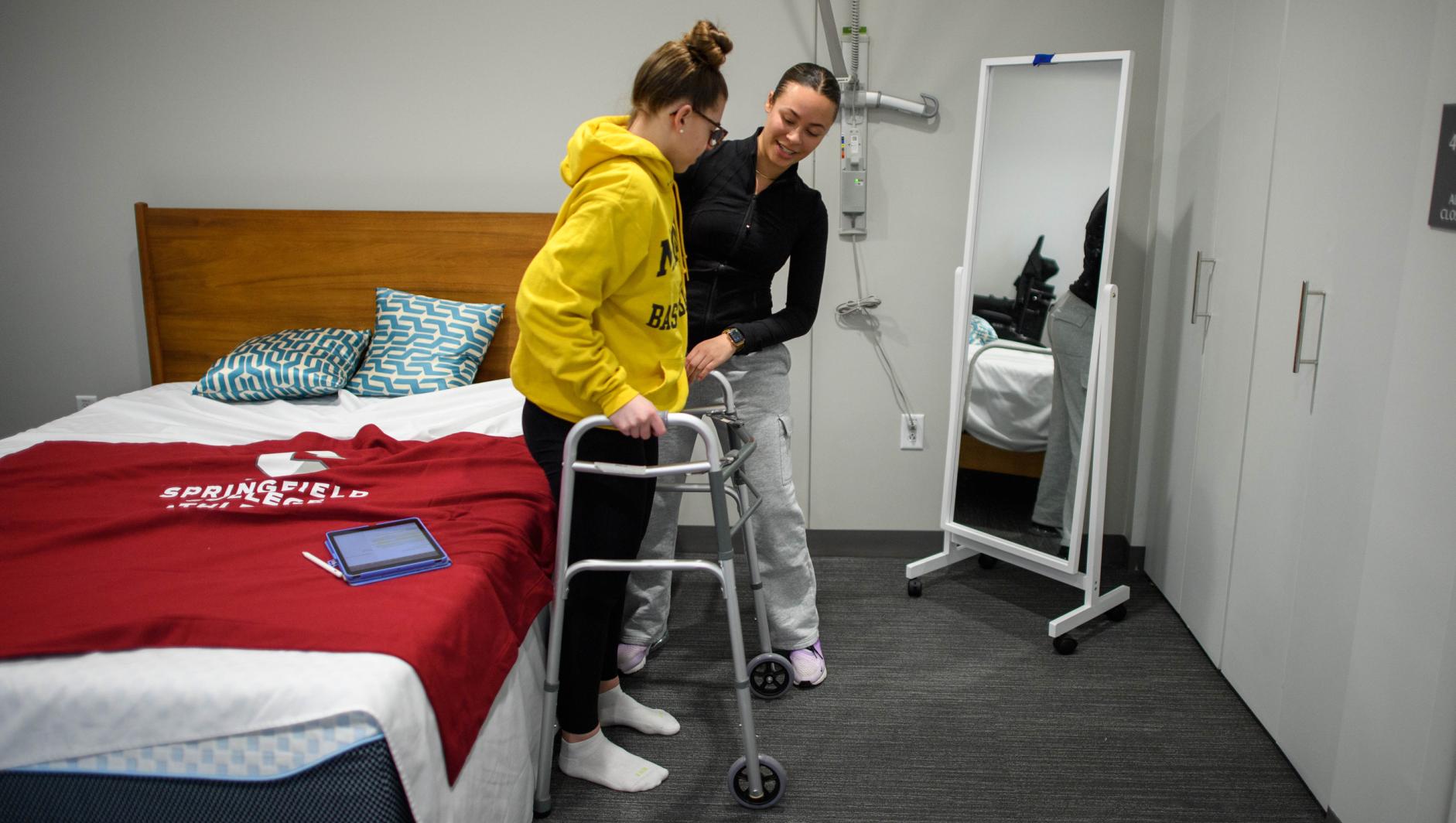 Springfield College Occupational Therapy students practice their clinical simulation competency inside the ADL Lab at the Health Sciences Center on February 15, 2024.