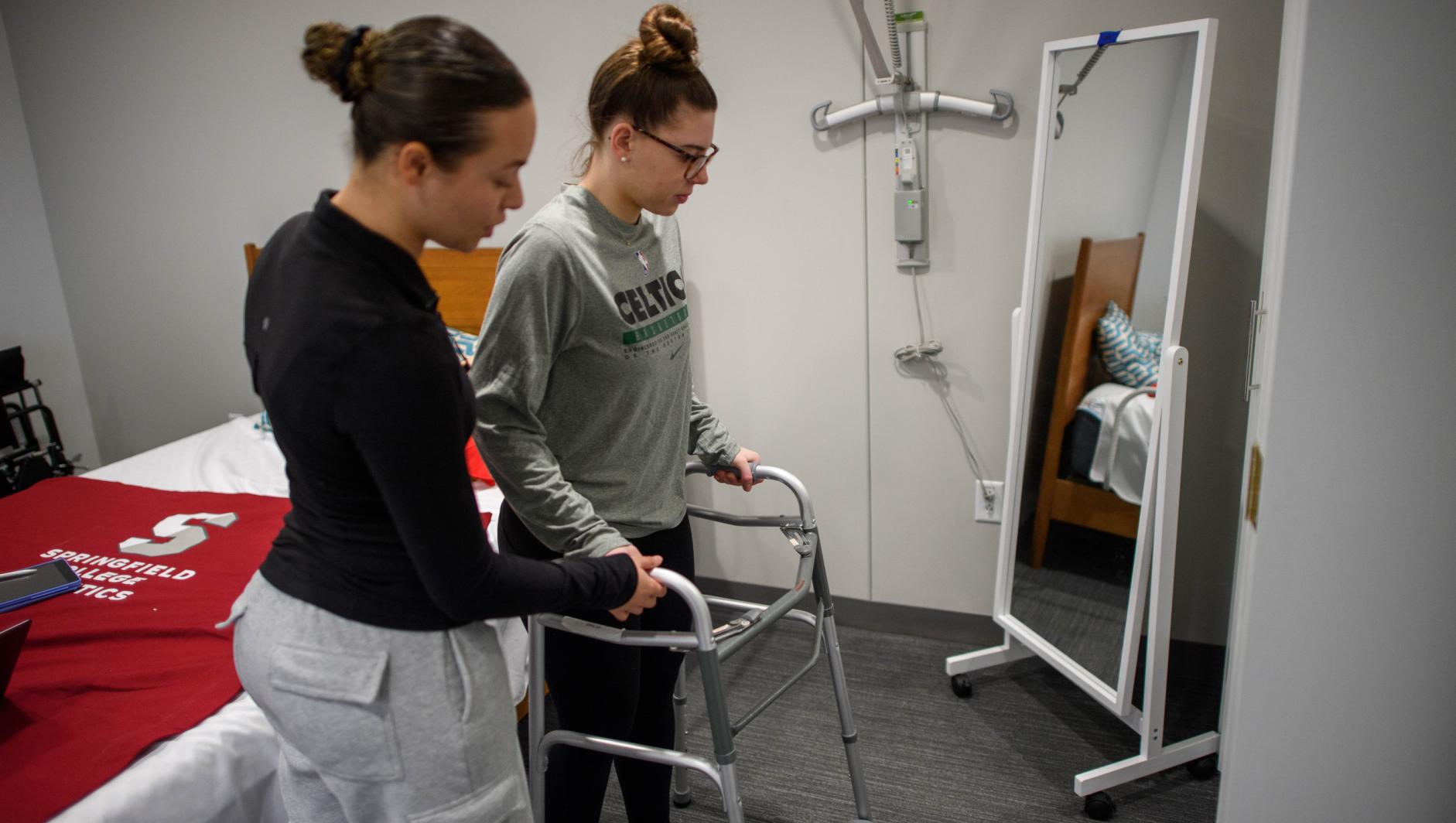 Springfield College Occupational Therapy students practice their clinical simulation competency inside the ADL Lab at the Health Sciences Center on February 15, 2024.