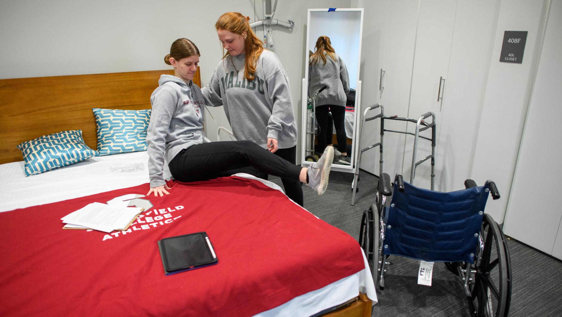 Springfield College Occupational Therapy students practice their clinical simulation competency inside the ADL Lab at the Health Sciences Center on February 15, 2024.