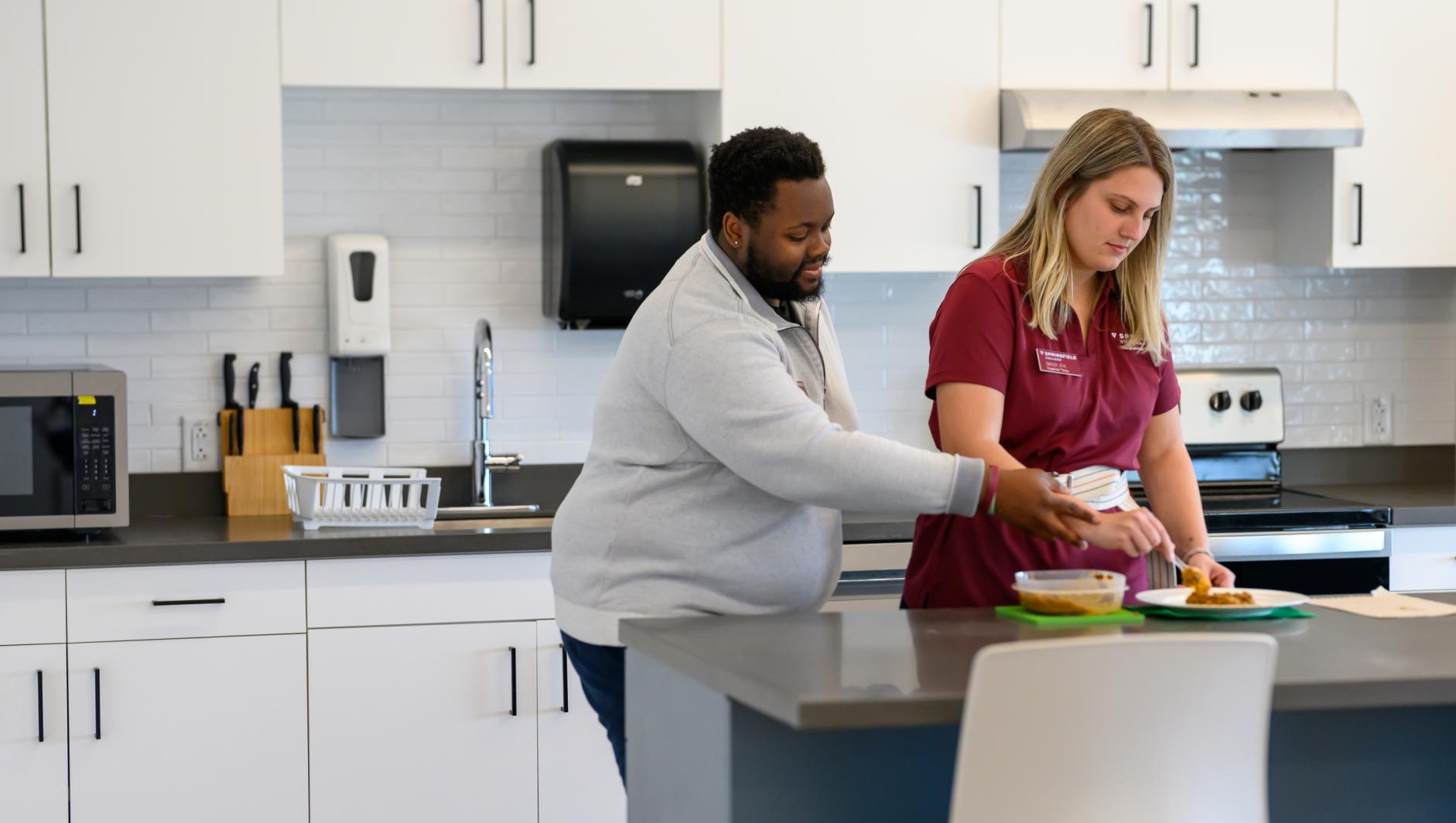 Springfield College Occupational Therapy students work in the Activities of Daily Living Lab in the Health Sciences Center on November 8, 2023.