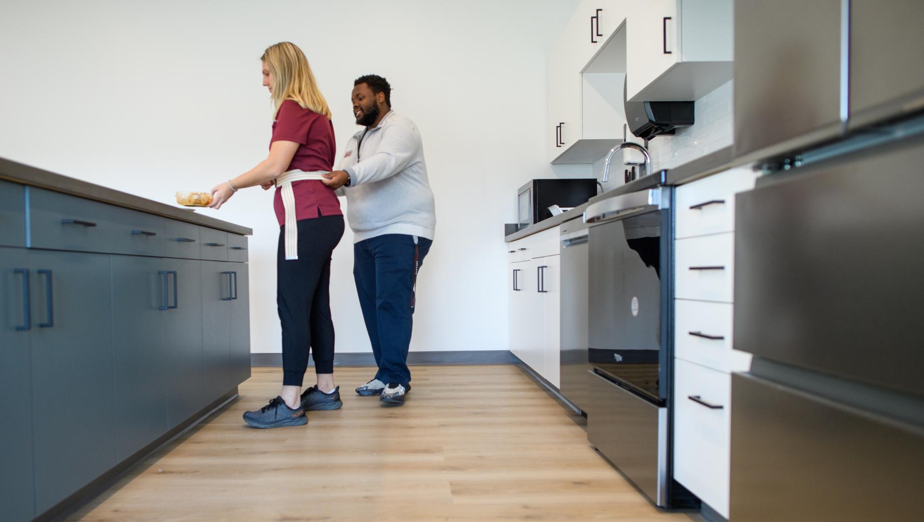 Springfield College Occupational Therapy students work in the Activities of Daily Living Lab in the Health Sciences Center on November 8, 2023.