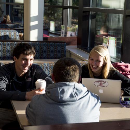 Students hanging out in the Flynn Campus Union