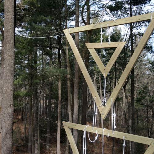 The triangle portion of the ropes course over east campus