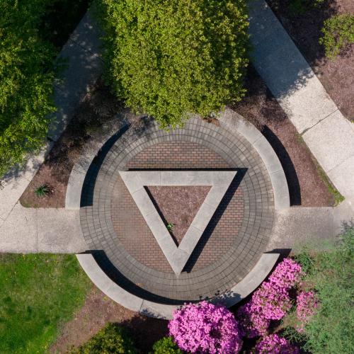 Triangle bench in the center of campus aerial view