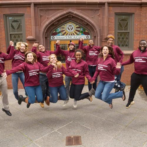 Students jumping in front of Judd