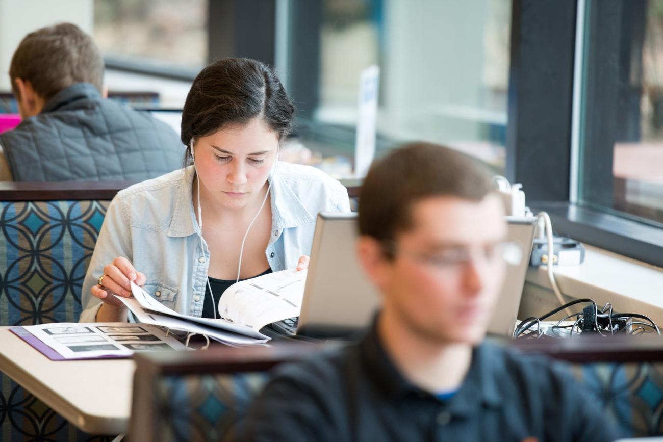 Female student studying in the campus union