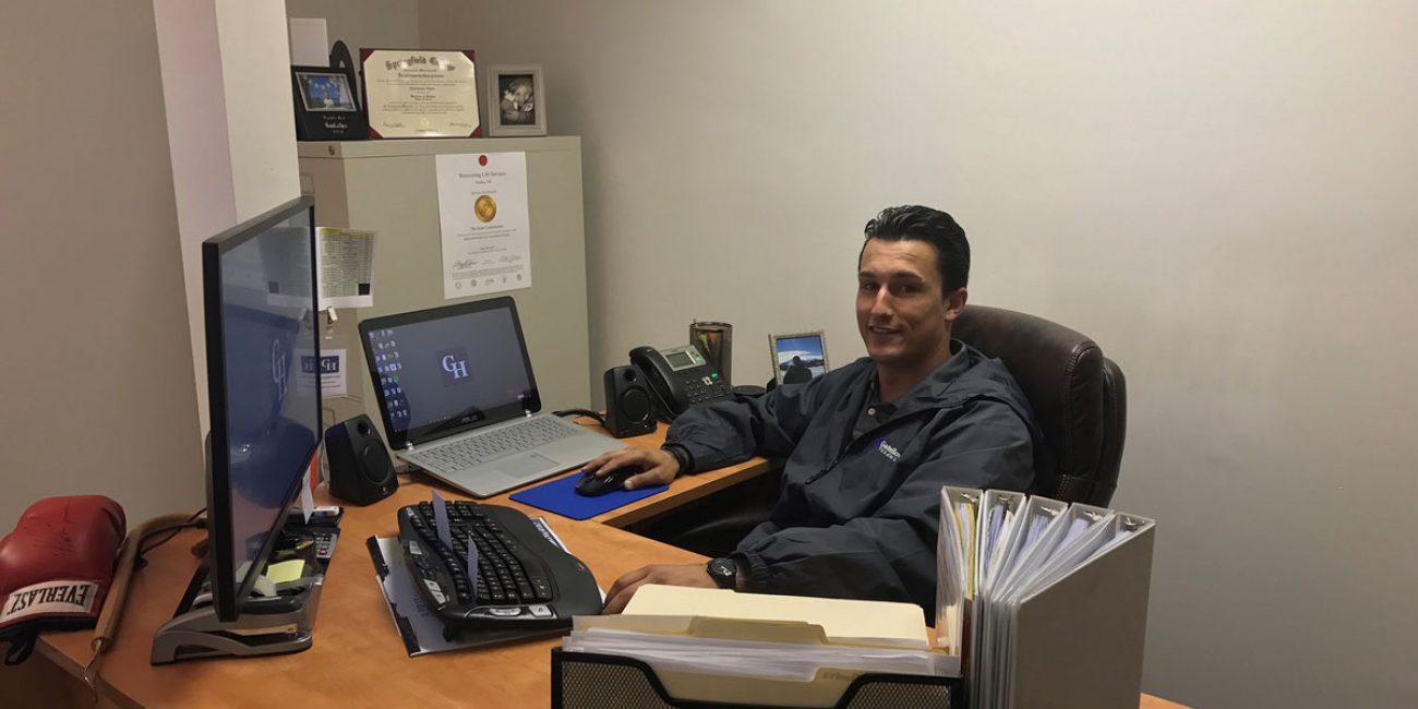 Chris Foster at his desk at the GateHouse Treatment center.