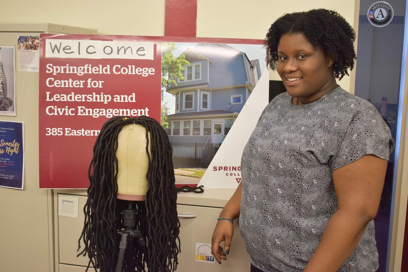 Springfield College Health Care Management major Charlene Adutwum is living our Humanics philosophy by helping make wigs for women of color that will be donated to the Cancer House of Hope in West Springfield.