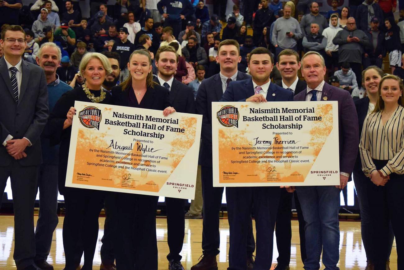 At left, Springfield College President Mary-Beth Cooper, Sport Management students Abigail Wylie, Jeremy Therrien, and Naismith Memorial Basketball Hall of Fame President and CEO John Doleva.