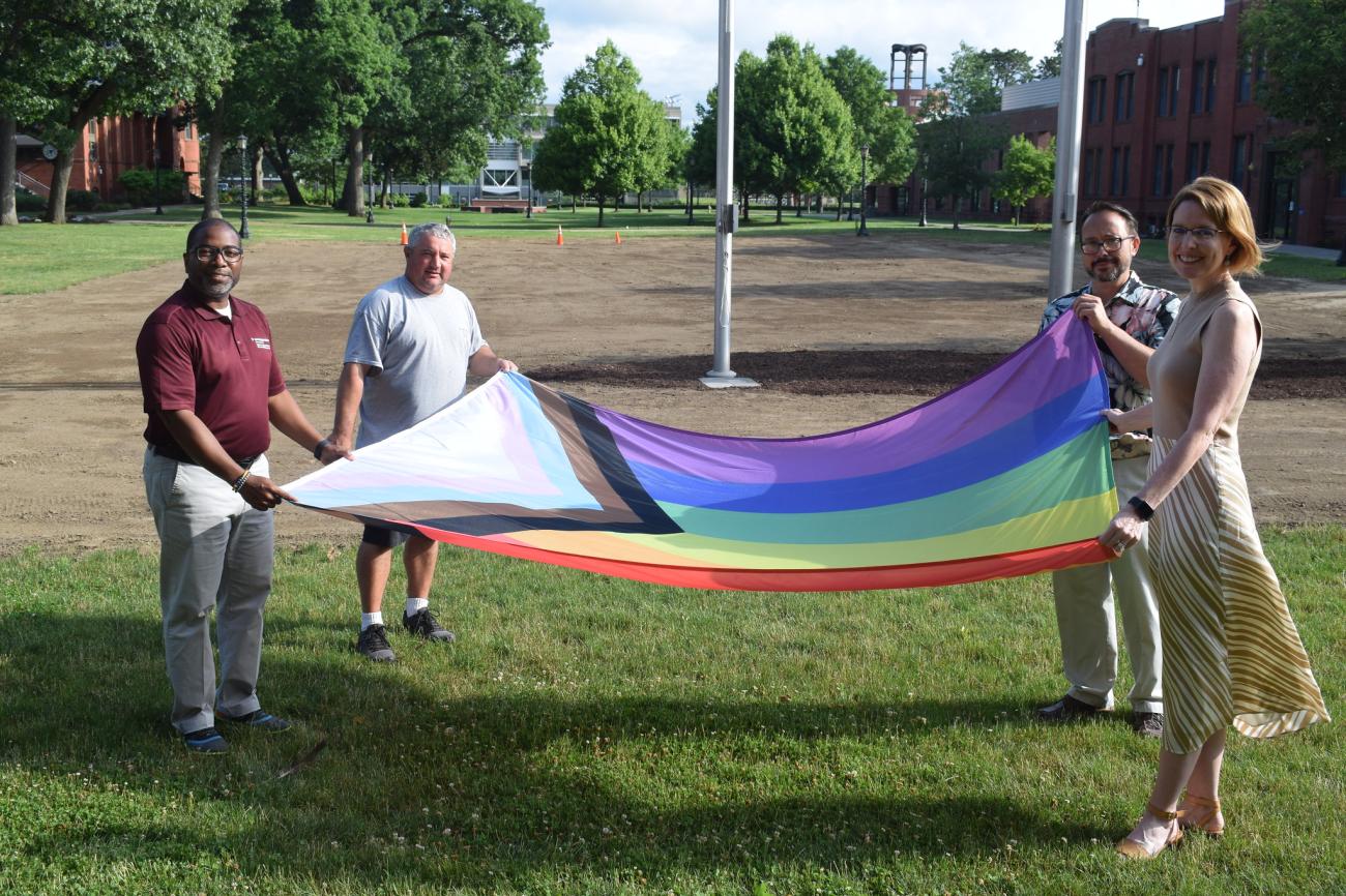 At left, Springfield College Vice President for Inclusion and Community Engagement Calvin Hill, Interim Grounds Supervisor Paul DeMaria, Chief of Staff Kathleen Martin, and Director of Spiritual Life David McMahon. 