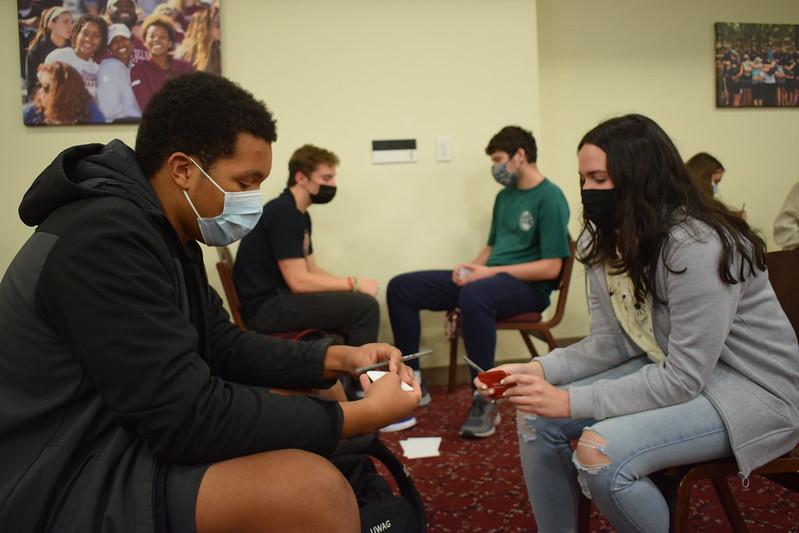 In this session, participants were paired with a stranger or someone they don't know well. They were given three cards, each a different level of depth in connection.