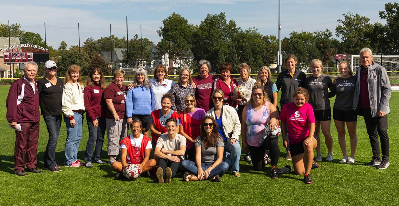 a group photo of participants at the celebration of 40 years of women's soccer