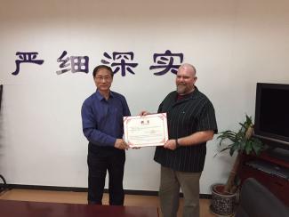 Director of Strength and Conditioning Brian Thompson receives his official appointment as an expert technical consultant to the Chinese National Fitness Trainers Association
