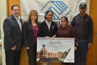 Springfield College Vice President for Student Affairs Shannon Finning presented Sufreimy Mota, 2018 Greater Springfield Boys & Girls Club Youth of the Year recipient, with a $20,000 undergraduate scholarship to attend Springfield College, at the recent youth of the year celebration at the Greater Springfield Boys & Girls Club.