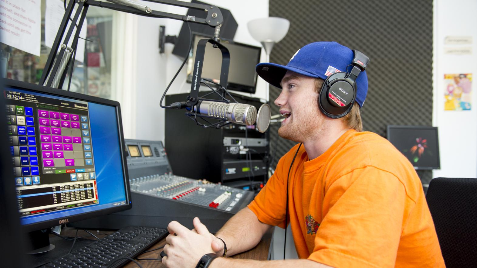 A student works in the on-campus radio station
