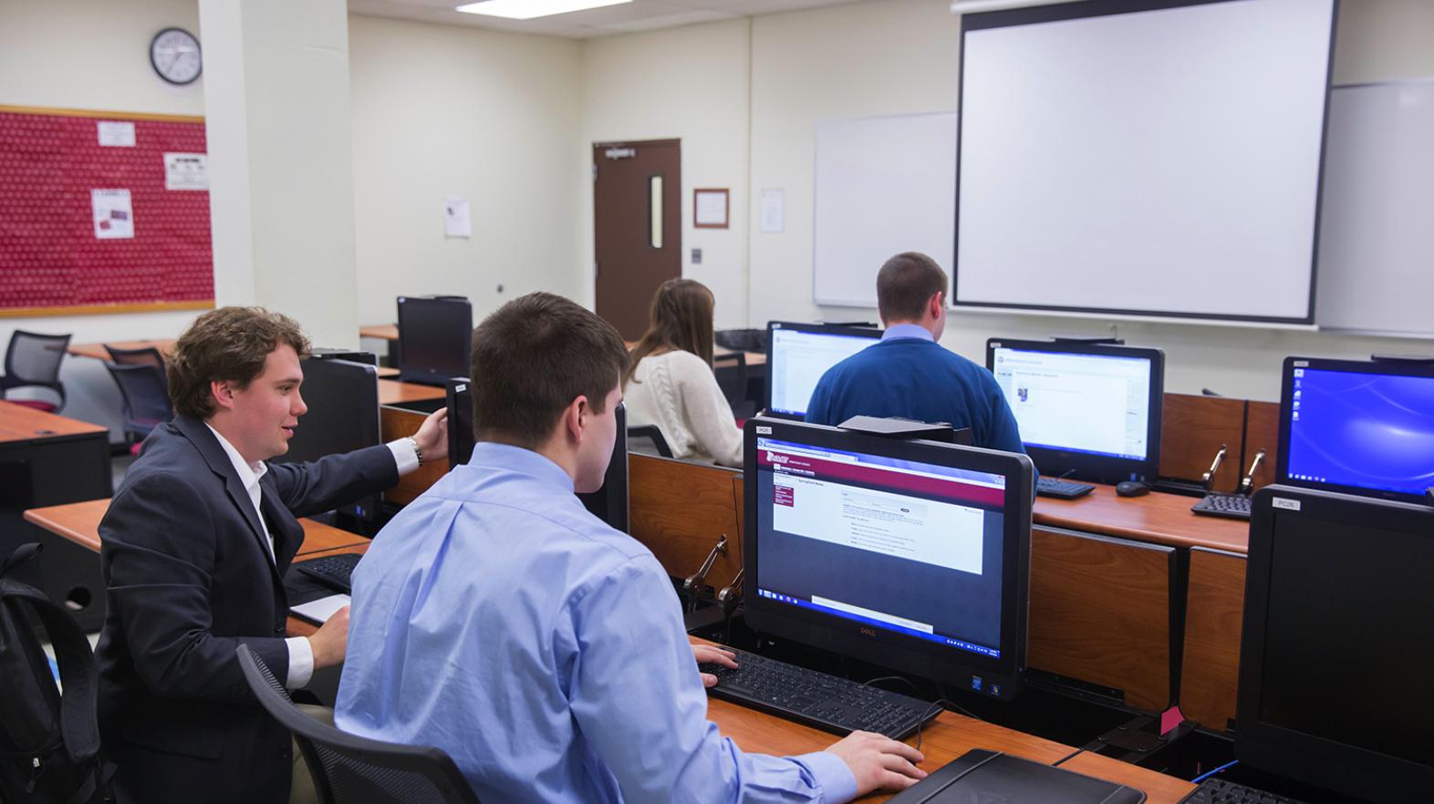 Students work on a computer in the classroom