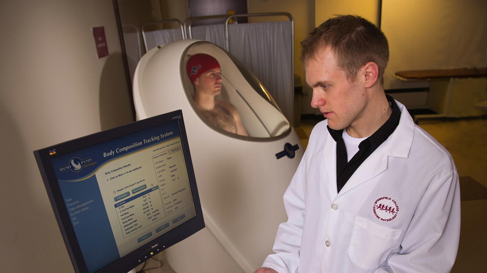 Students work in the lab using the Body Composition Tracking System